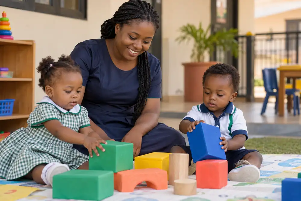 Creche children playing and learning with their carer